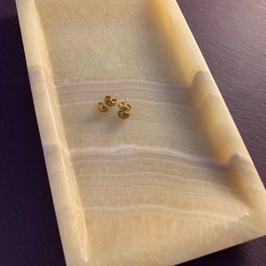 Gold stud earrings from Guyana, South America